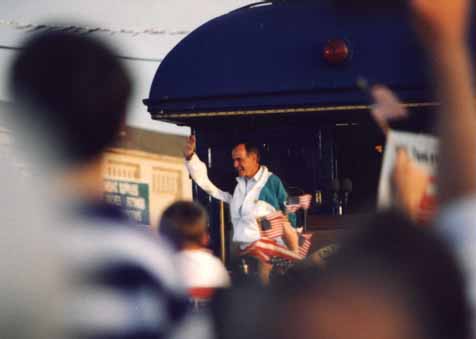 A photo of President George Bush waving to the crowd at his Campaign '92 whistle-stop in Burlington, NC 