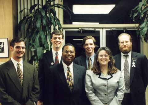 A photo of Horace Cooper and the Executive Committee of the UNCG College Republicans 